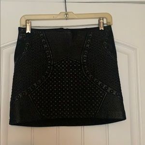 Black leather mini skirt
